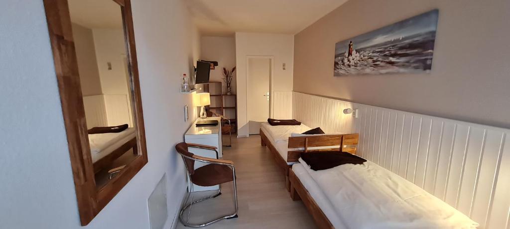 Postel nebo postele na pokoji v ubytování Hotel Herrenhof