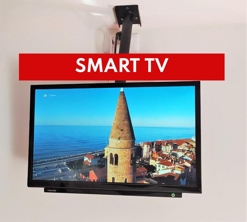 TV a/nebo společenská místnost v ubytování B&B Caorle For You