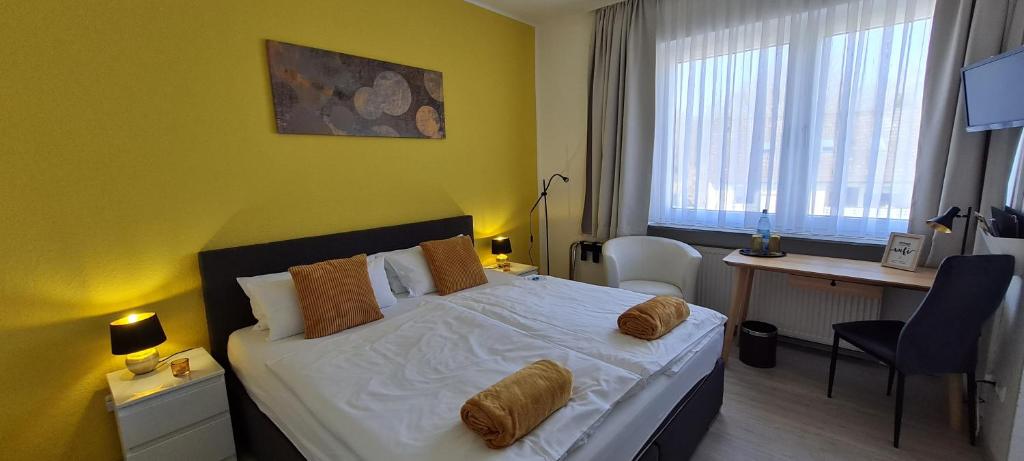Postel nebo postele na pokoji v ubytování Hotel Herrenhof