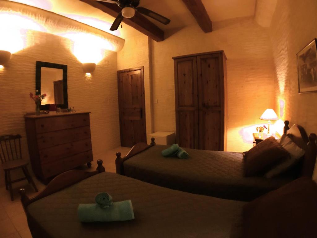 Postel nebo postele na pokoji v ubytování Ad Hoc B&B
