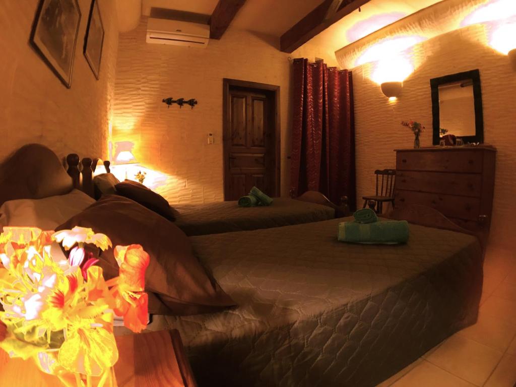 Postel nebo postele na pokoji v ubytování Ad Hoc B&B