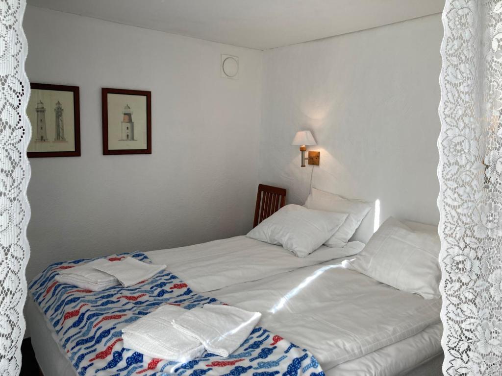 Letto o letti in una camera di Lunkaberg Bed & Breakfast
