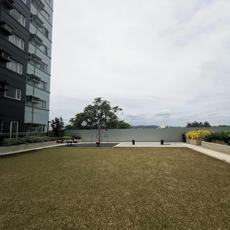 a large lawn in front of a building at Avida Davao Condos, downtown CM Recto Avenue, Davao City in Davao City