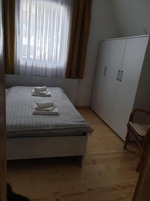 Postel nebo postele na pokoji v ubytování Šumske priče Divčibare