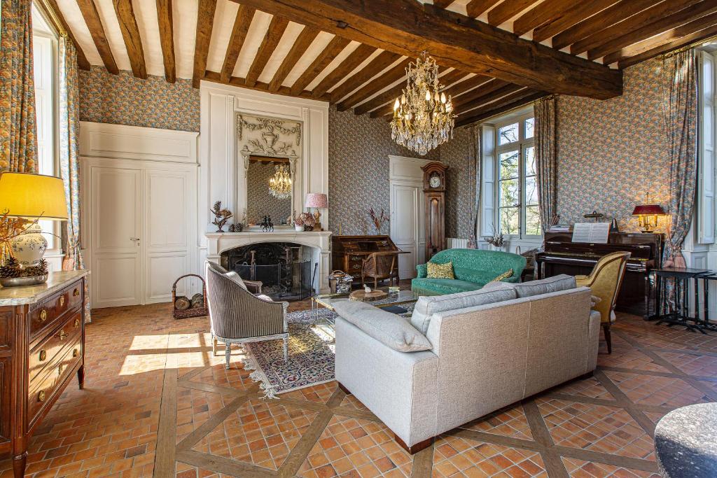 Posezení v ubytování Manoir de la Voute maison d'hôtes