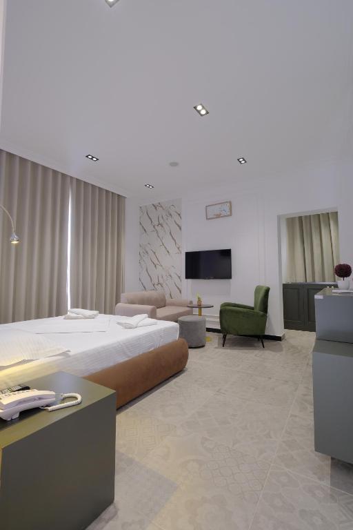 Postel nebo postele na pokoji v ubytování NOLEA Boutique Hotel