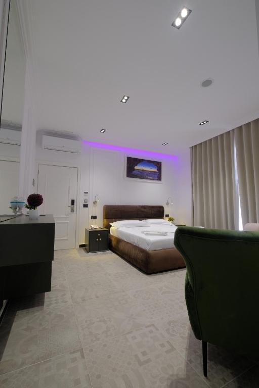 Postel nebo postele na pokoji v ubytování NOLEA Boutique Hotel