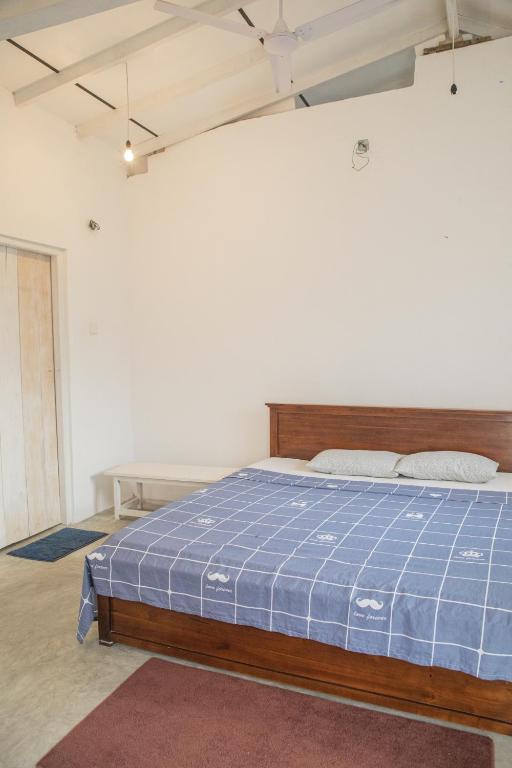 Postel nebo postele na pokoji v ubytování Kodi Beach Home