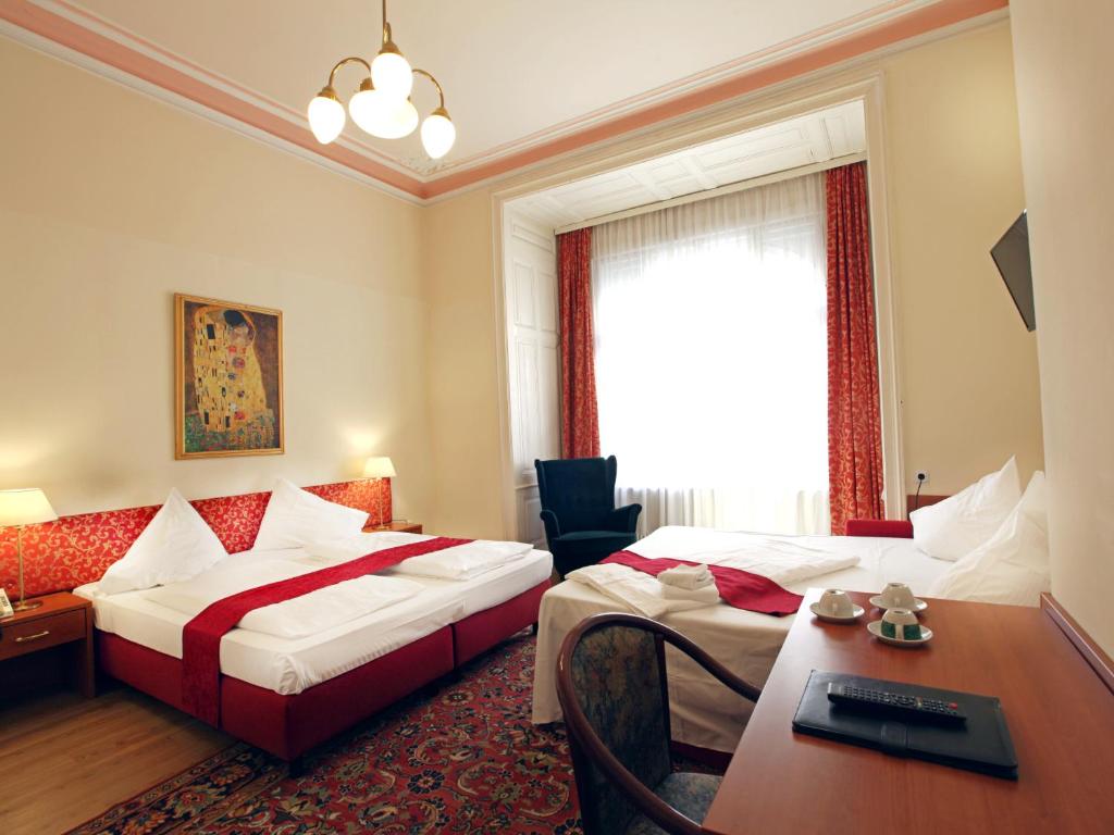 Cama o camas de una habitación en HPA Hotel Andreas