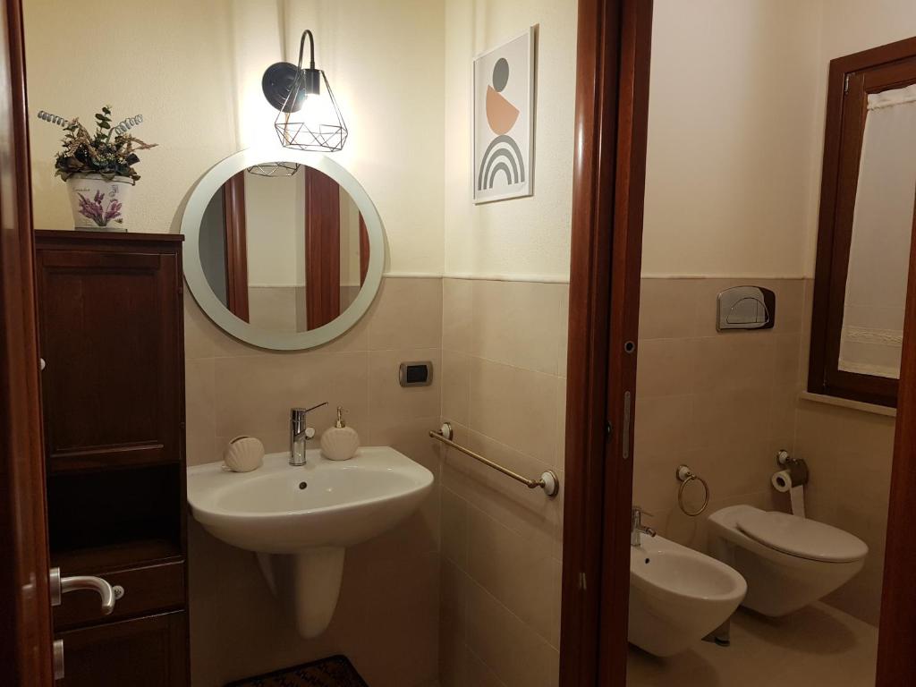 A bathroom at Grace dell'isola dei Coralli