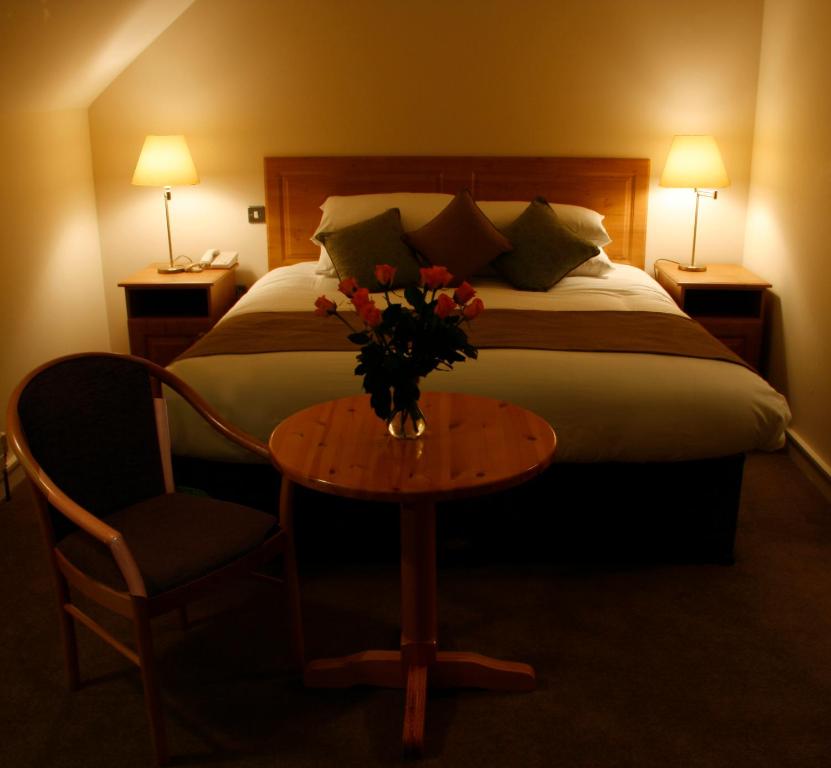 Letto o letti in una camera di Deebert House Hotel