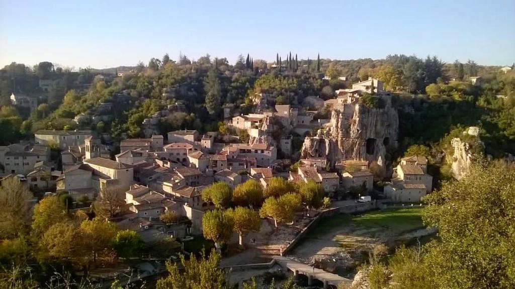 an aerial view of a small village with houses at Lou mouli di baou in Labeaume