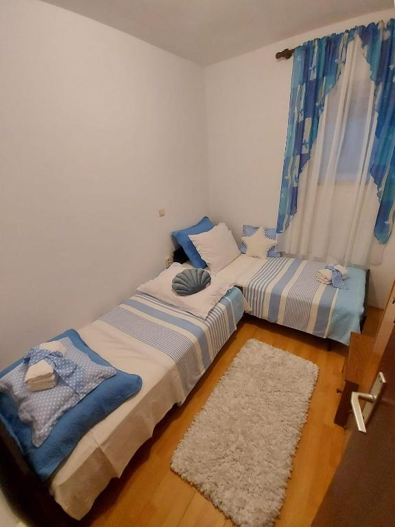 Postel nebo postele na pokoji v ubytování Apartment Nataša- Apt.1