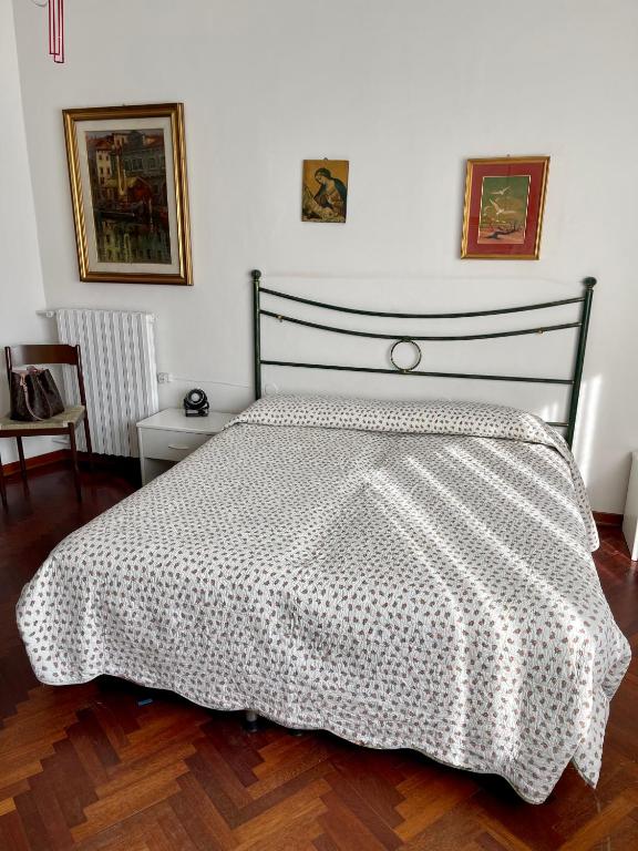 Posteľ alebo postele v izbe v ubytovaní Piazza Italia Charming Sea Apartments