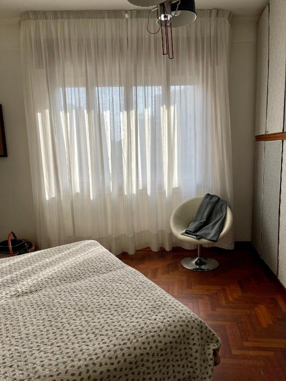 Posteľ alebo postele v izbe v ubytovaní Piazza Italia Charming Sea Apartments
