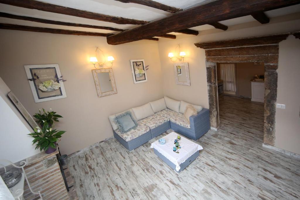 Posezení v ubytování sacrobosco apartment Ulivo