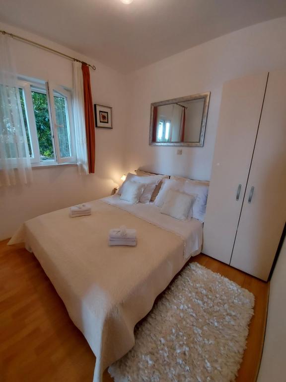 Postel nebo postele na pokoji v ubytování Apartment Nataša- Apt.1