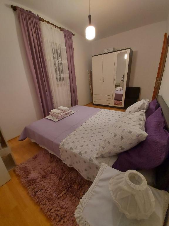 Postel nebo postele na pokoji v ubytování Apartment Nataša- Apt.1