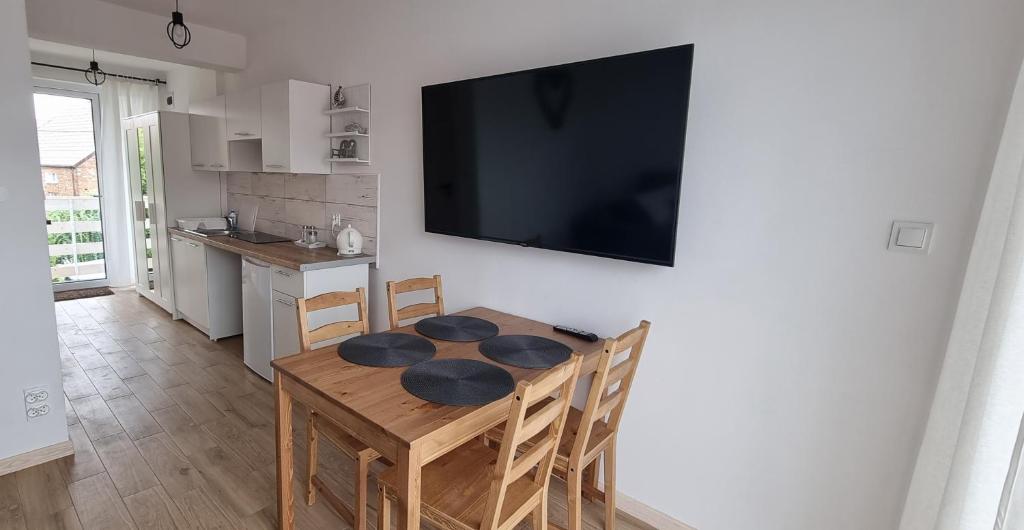 Kuchyňa alebo kuchynka v ubytovaní Nowe apartamenty Kuźnica Hel