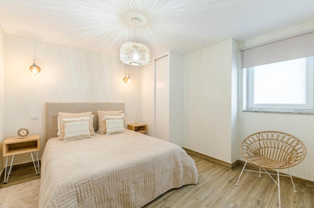 Postel nebo postele na pokoji v ubytování Chalet Villas Gerês