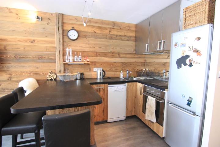 Kuchyň nebo kuchyňský kout v ubytování Trois Vallées Appartements VTI