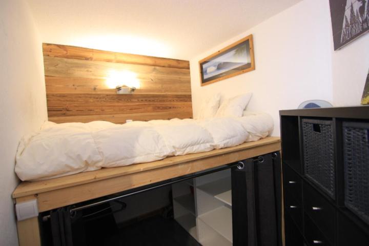 Postel nebo postele na pokoji v ubytování Trois Vallées Appartements VTI