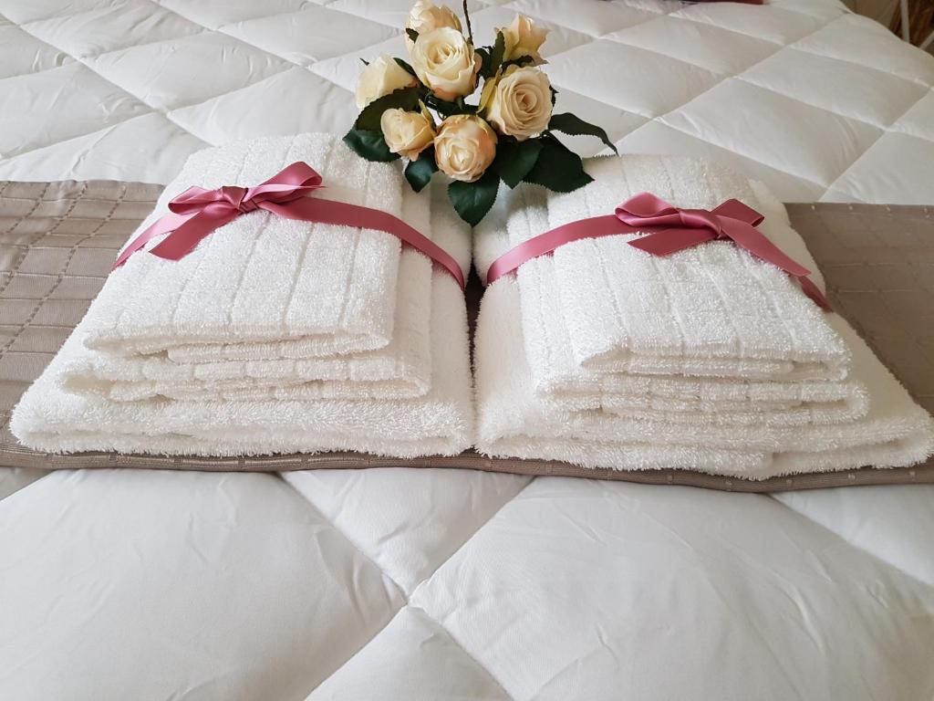 A bed or beds in a room at Grace dell'isola dei Coralli
