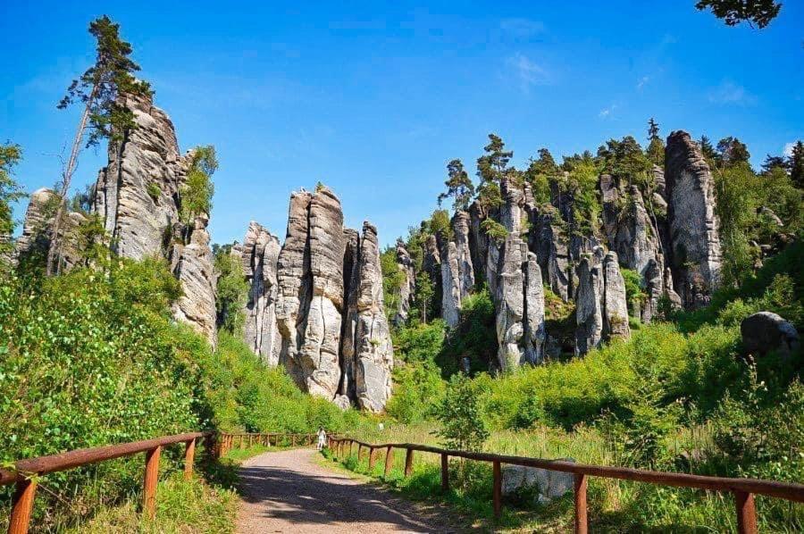a path in front of a rocky mountain at W apartmán 2 in Teplice nad Metují