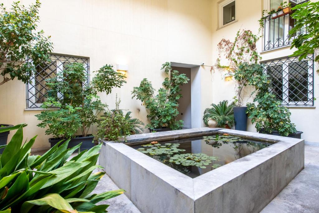 A garden outside Moncada Suites & Apartments
