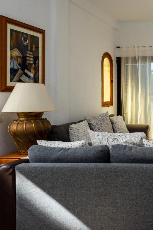 A bed or beds in a room at Las Carabelas 8, next to the Sea and all Amenities