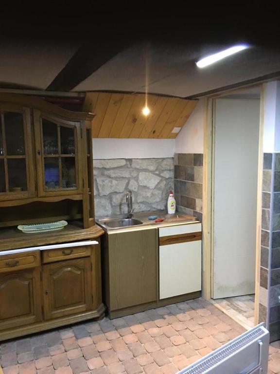 Kuchyň nebo kuchyňský kout v ubytování Dombi Porta