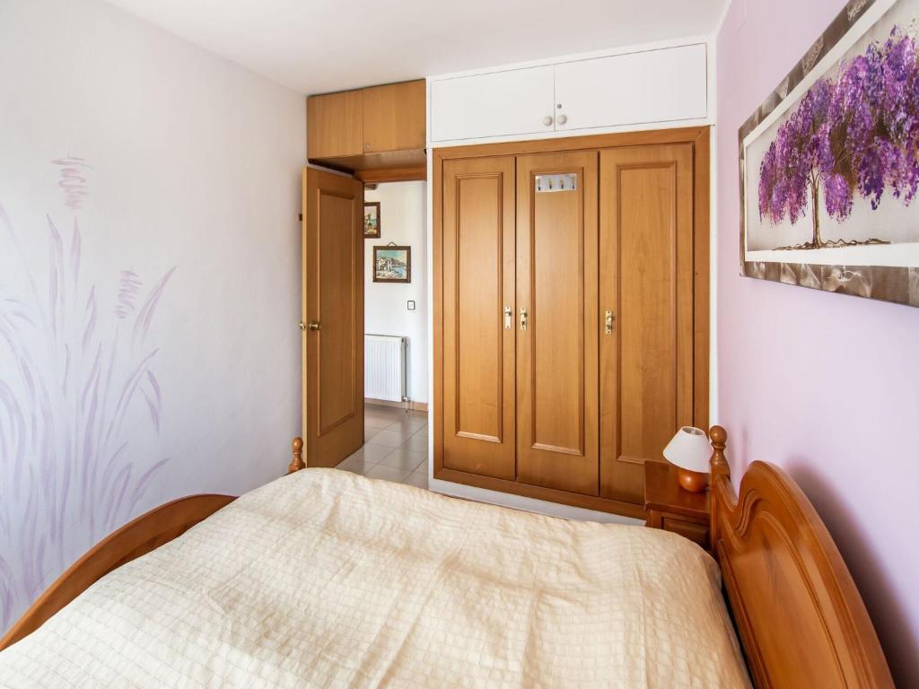 Posteľ alebo postele v izbe v ubytovaní Belvilla by OYO Sant Pere Playa
