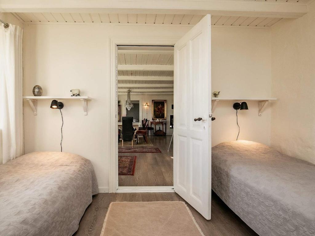 Postel nebo postele na pokoji v ubytování Holiday home Løkken CLXVI