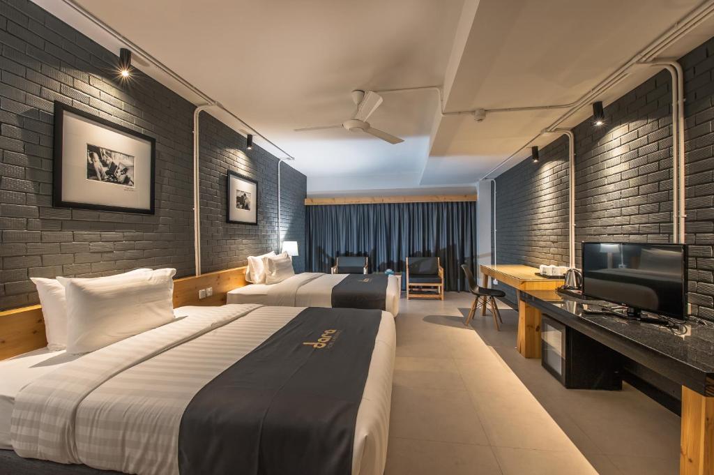 Postel nebo postele na pokoji v ubytování DARA Hotel - SHA Plus