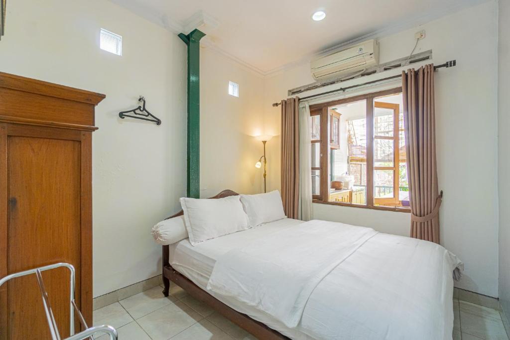 Posteľ alebo postele v izbe v ubytovaní Omah Gerjen 29 by Bukit Vista