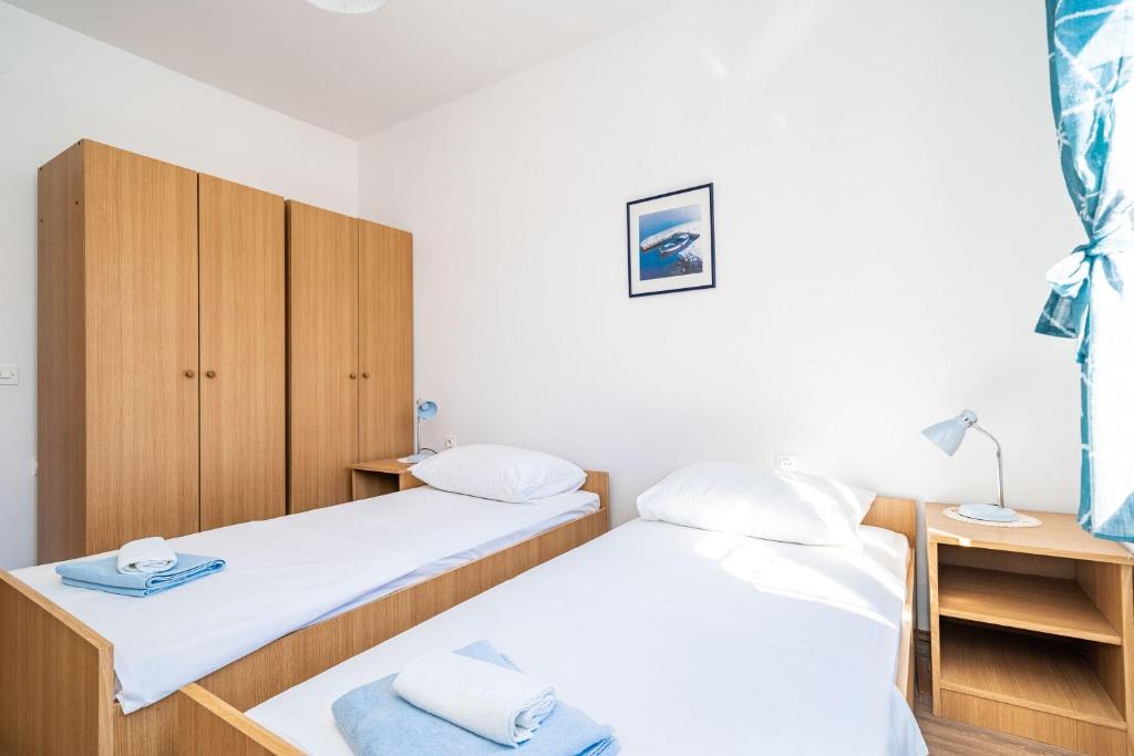 Posteľ alebo postele v izbe v ubytovaní Apartment Bobić