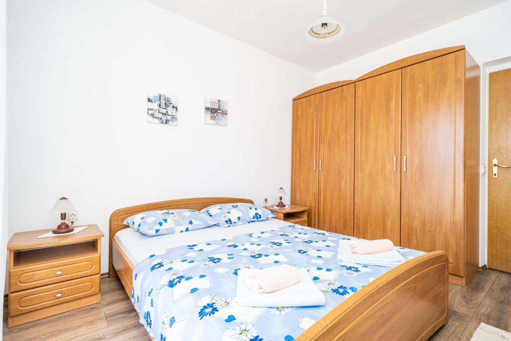 Posteľ alebo postele v izbe v ubytovaní Apartment Bobić