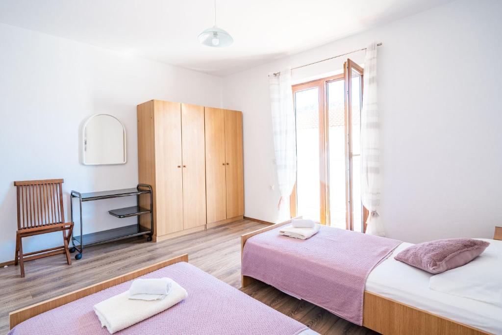 Posteľ alebo postele v izbe v ubytovaní Apartment Bobić