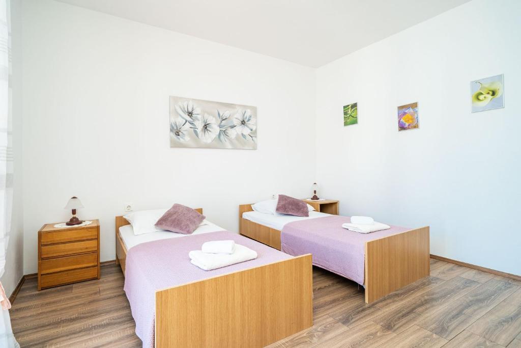 Posteľ alebo postele v izbe v ubytovaní Apartment Bobić