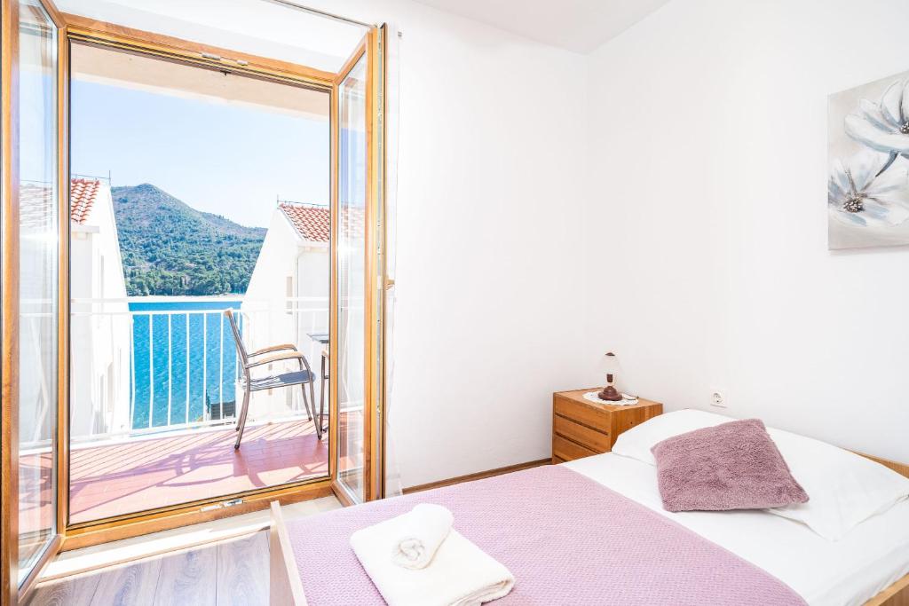 Posteľ alebo postele v izbe v ubytovaní Apartment Bobić
