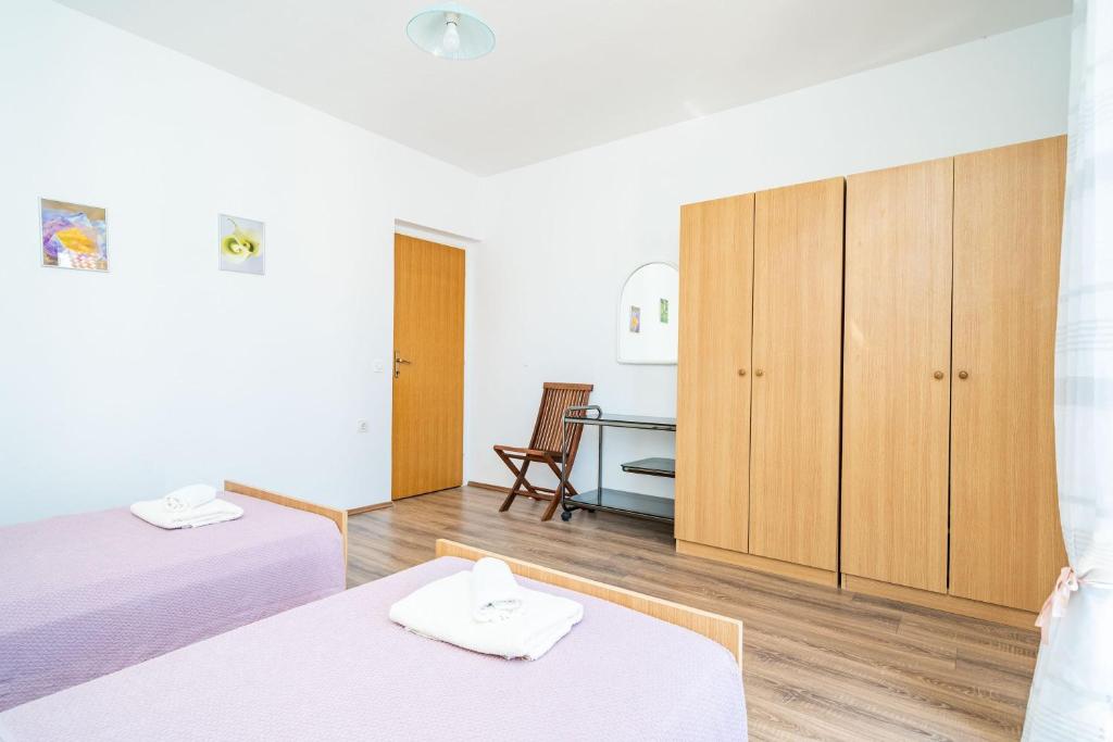 Posteľ alebo postele v izbe v ubytovaní Apartment Bobić