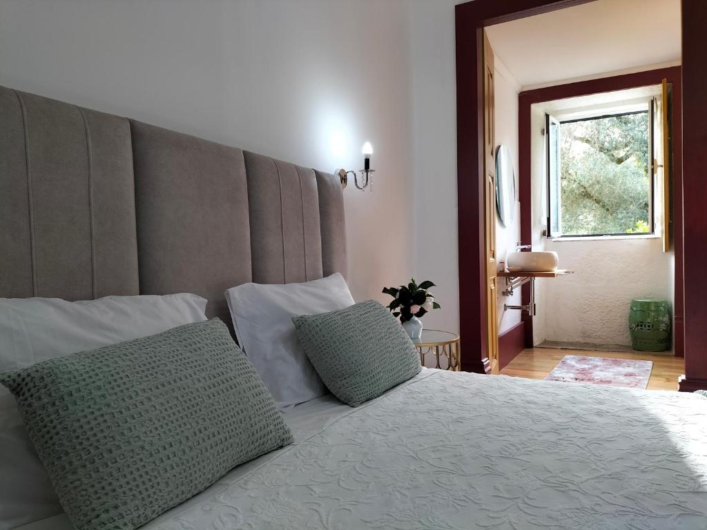 Cama ou camas em um quarto em Quinta de Castelhão
