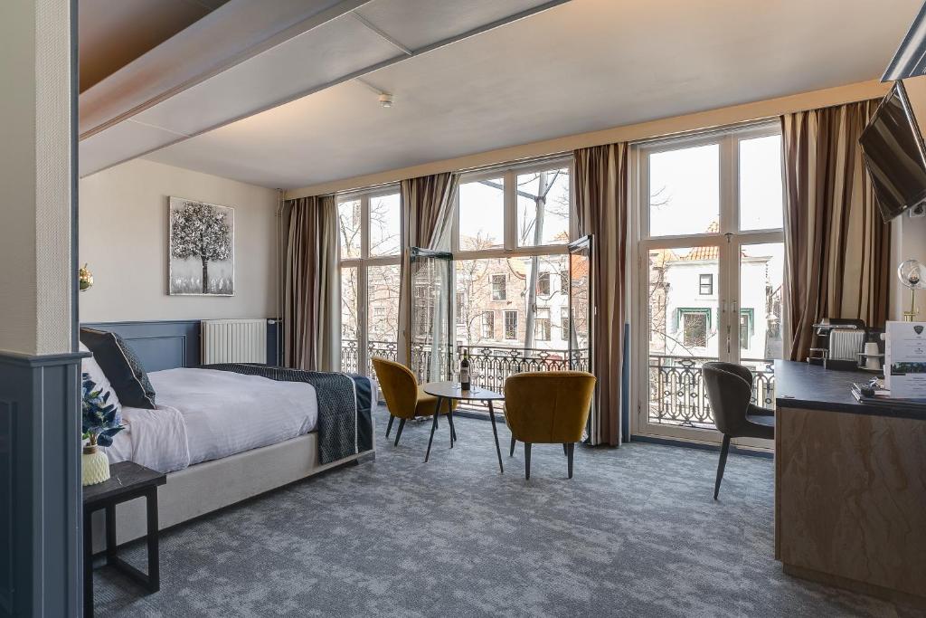 Postel nebo postele na pokoji v ubytování Hotel Royal Bridges