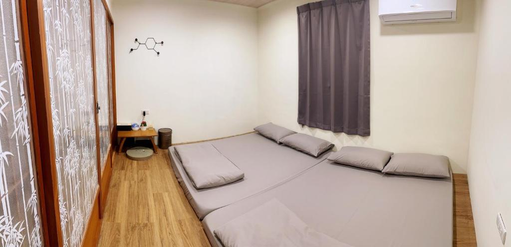 Postel nebo postele na pokoji v ubytování 東澳海安獨木舟背包客棧Hai An 2 Hostel