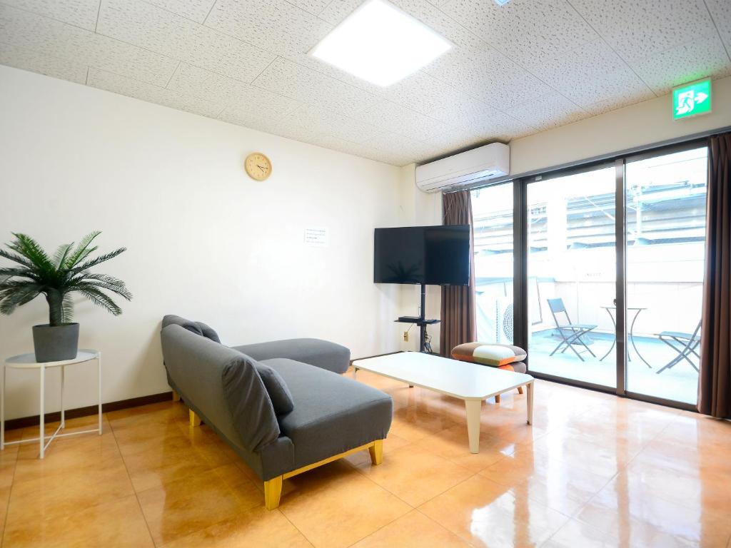 TV a/nebo společenská místnost v ubytování K's Hotel