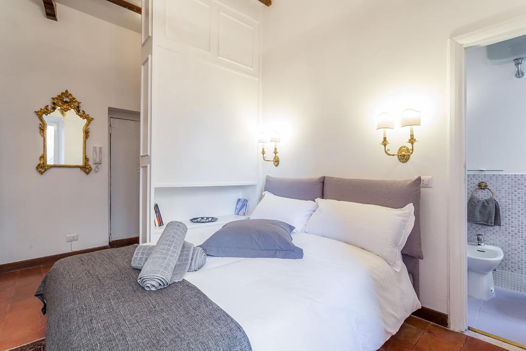 A bed or beds in a room at Sora Menica Twin