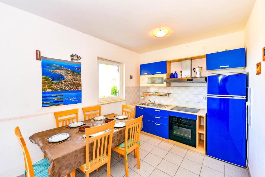 Kuchyň nebo kuchyňský kout v ubytování Apartments Silvia