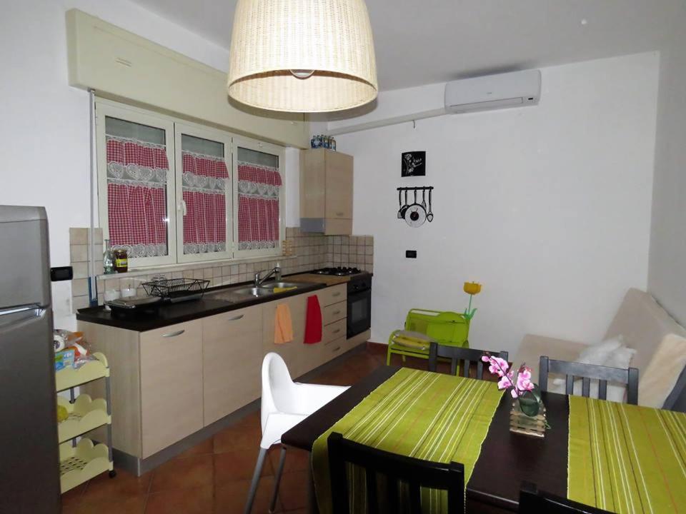 Kuchyň nebo kuchyňský kout v ubytování B&B Le Rose del Tirreno