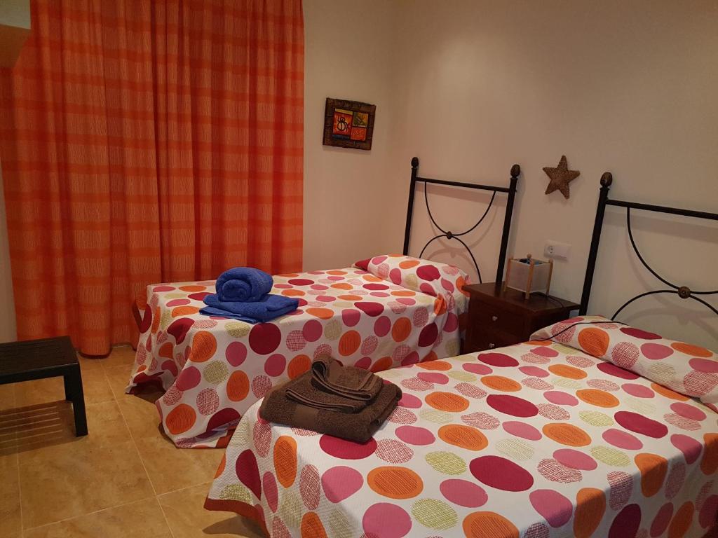 Postel nebo postele na pokoji v ubytování Al Andalus Thalassa III VERARENTAL-COM