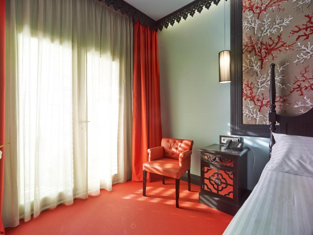 Postel nebo postele na pokoji v ubytování Villa Delisle Hôtel & Spa
